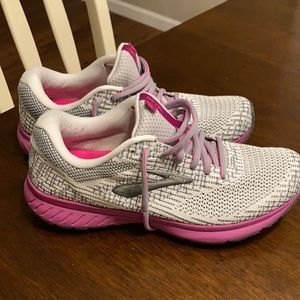 Brooks running shoes.  Worn about 5-7 times for walking. Just too small!